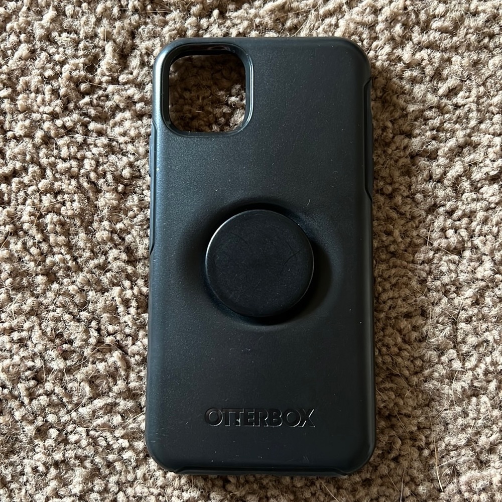 OtterBox Black iPhone 11 ProMax Case with pop socket attached